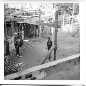 Where is the Gaiety? Still Images. Notting Hill Gate. Inside the Adventure Playground. 1973. Children holding swing ropes 1. Deposited with MayDay Rooms by Wilf Thust. December, 2013.