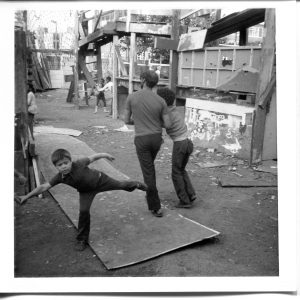 Where is the Gaiety? Still Images. Notting Hill Gate. Inside the Adventure Playground. 1973. Children and play ‘leader’. Deposited with MayDay Rooms by Wilf Thust. December, 2013.