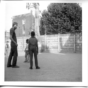 Where is the Gaiety? Still Images. Notting Hill Gate. Inside the Adventure Playground. 1973. Play ‘leader’ with children 2. Deposited with MayDay Rooms by Wilf Thust. December, 2013.